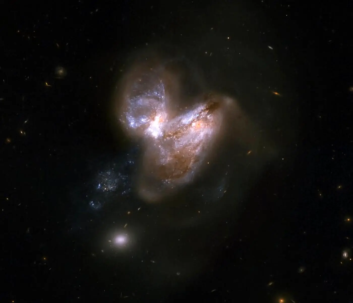 IC-694-and-NGC-3690.webp