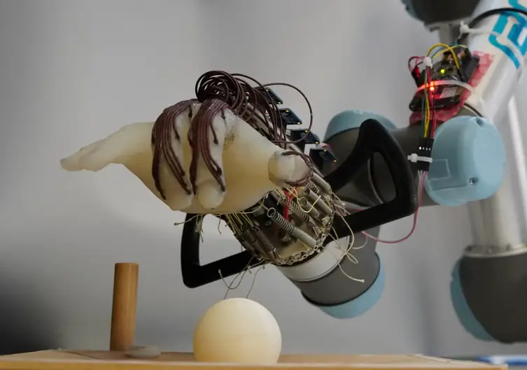 Energy-Efficient-Robot-Hand-Learns-How-Not-To-Drop-the-Ball-2048x1436.webp