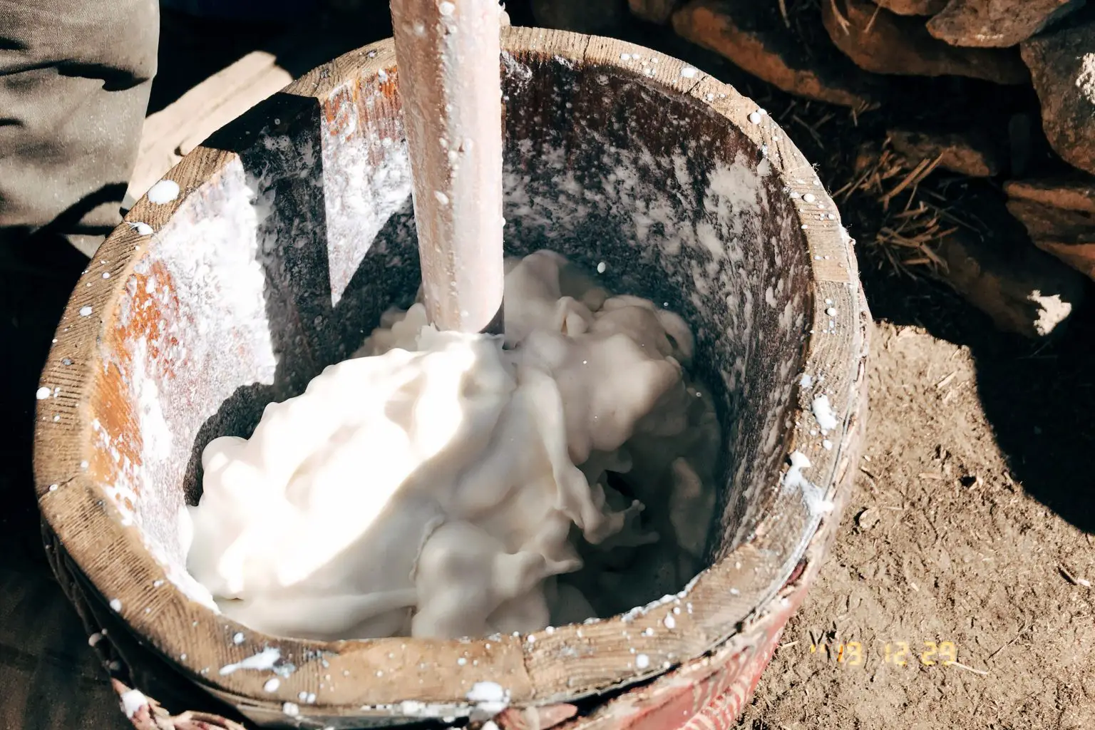 Tibetan-Pastoralist-Churning-Yak-Milk-1536x1024.webp