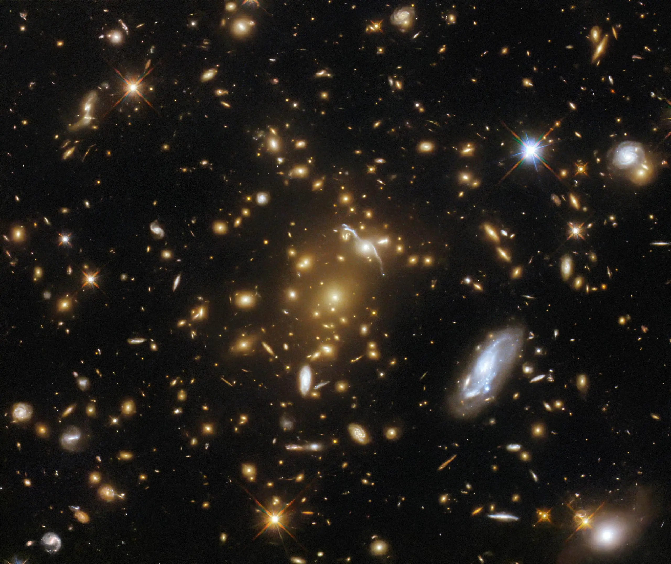 Gravitationally-Lensed-Galaxy-Cluster-scaled.webp