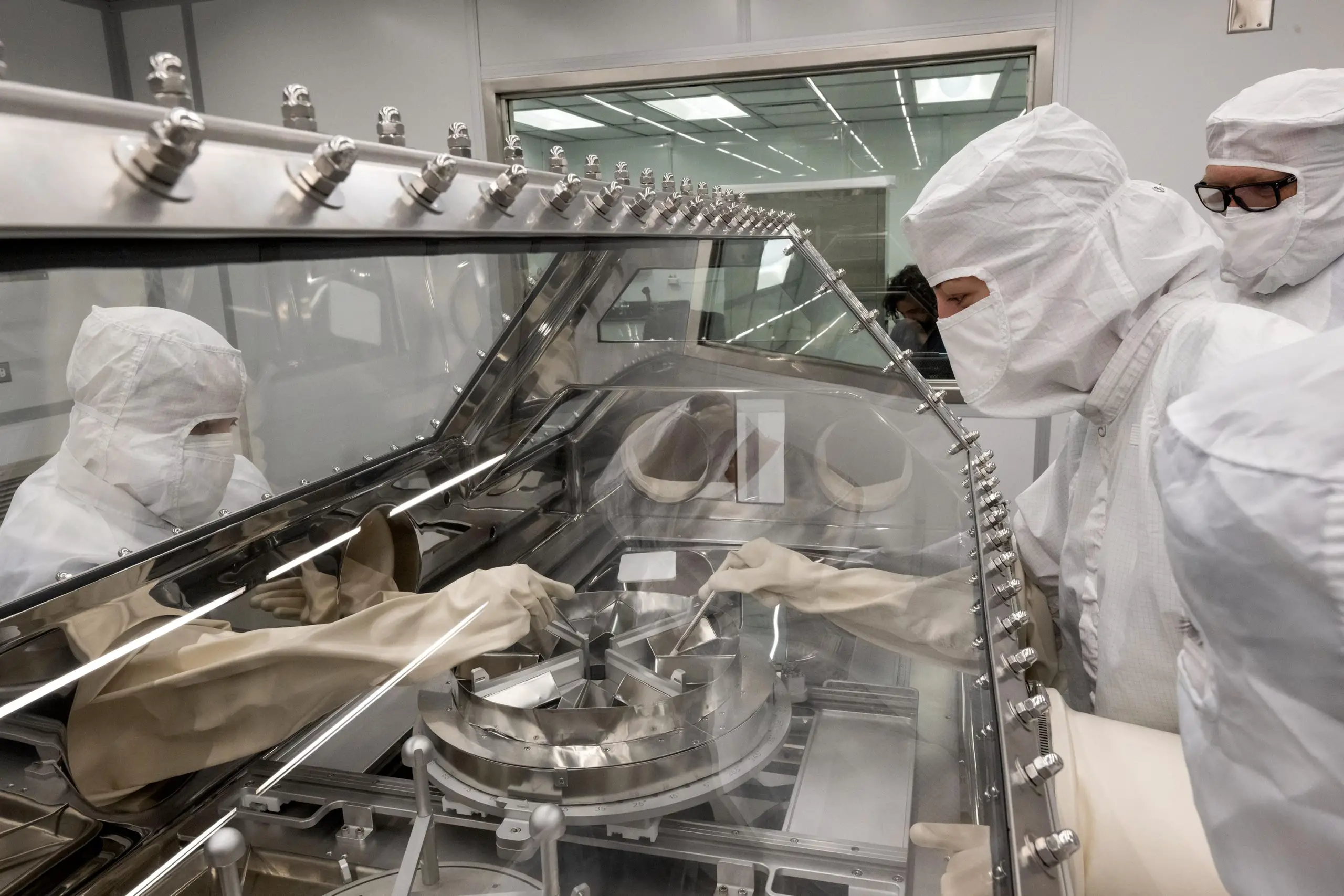 NASA-OSIRIS-REx-Curation-Team-Rehearses-Opening-Asteroid-Sample-Canister-scaled.webp