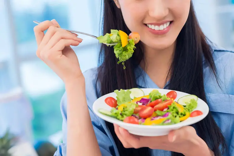 Happy-Vegetarian-Eating-Salad.webp