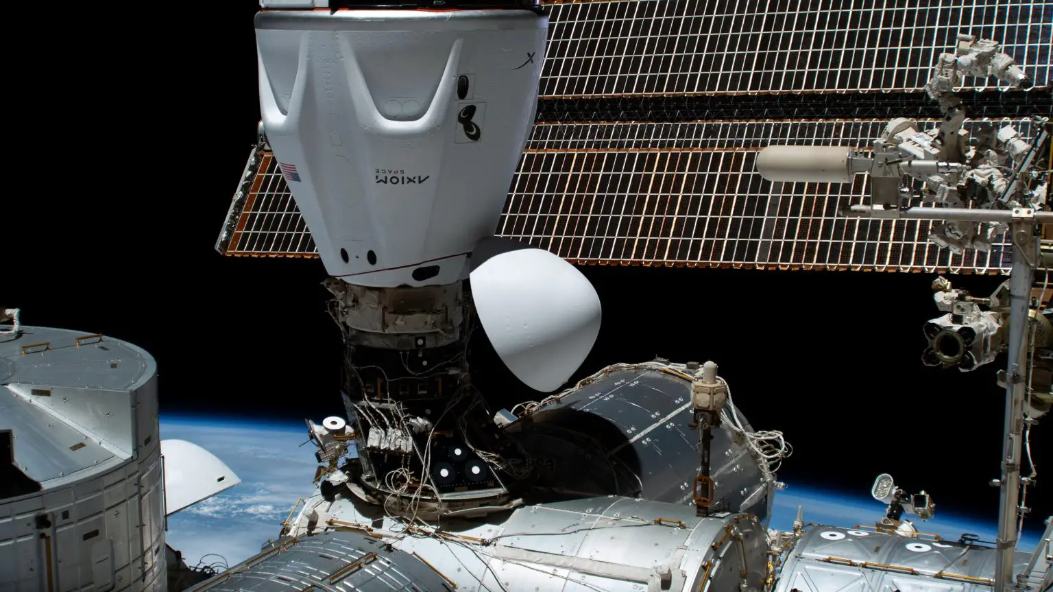 SpaceX-Dragon-Freedom-Spacecraft-Docked-Space-Station-1536x863.webp