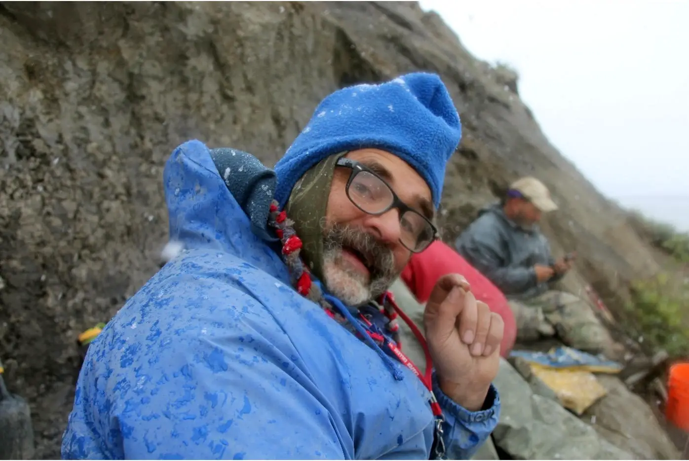 JP-Cavigelli-Holds-Up-a-Tiny-Mammal-Tooth.webp