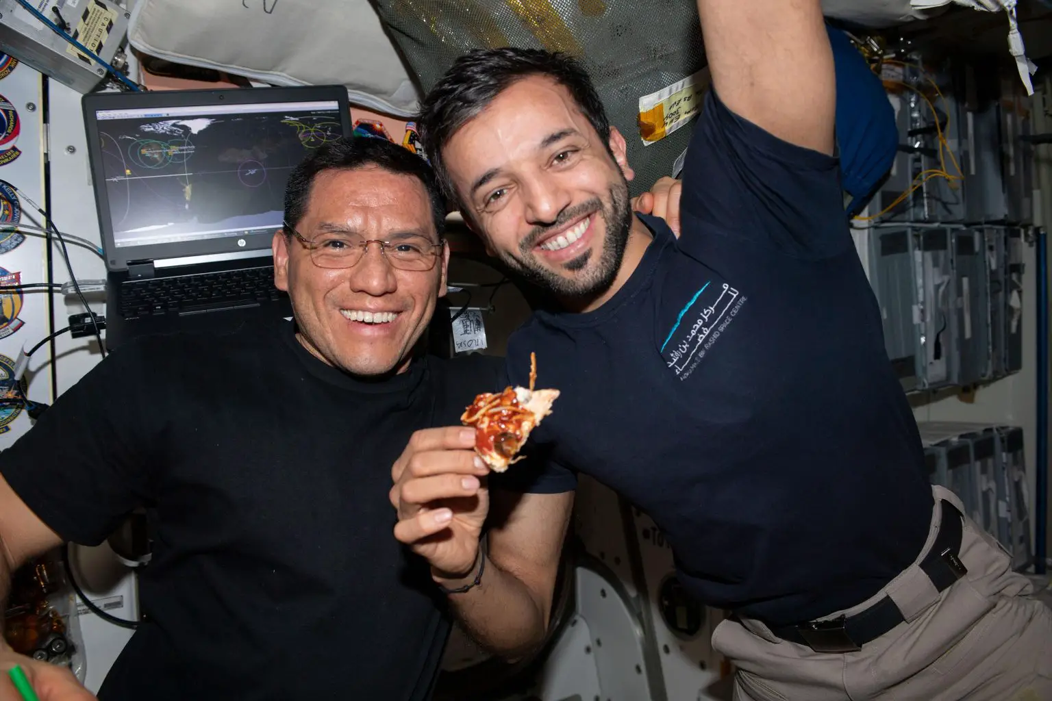 Astronauts-Frank-Rubio-and-Sultan-Alneyadi-Enjoy-Pizza-1536x1024.webp