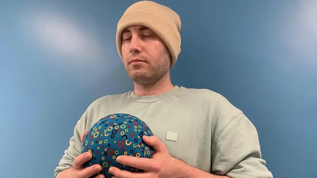 Alexz-Farrall-and-His-Paws-Ball.webp