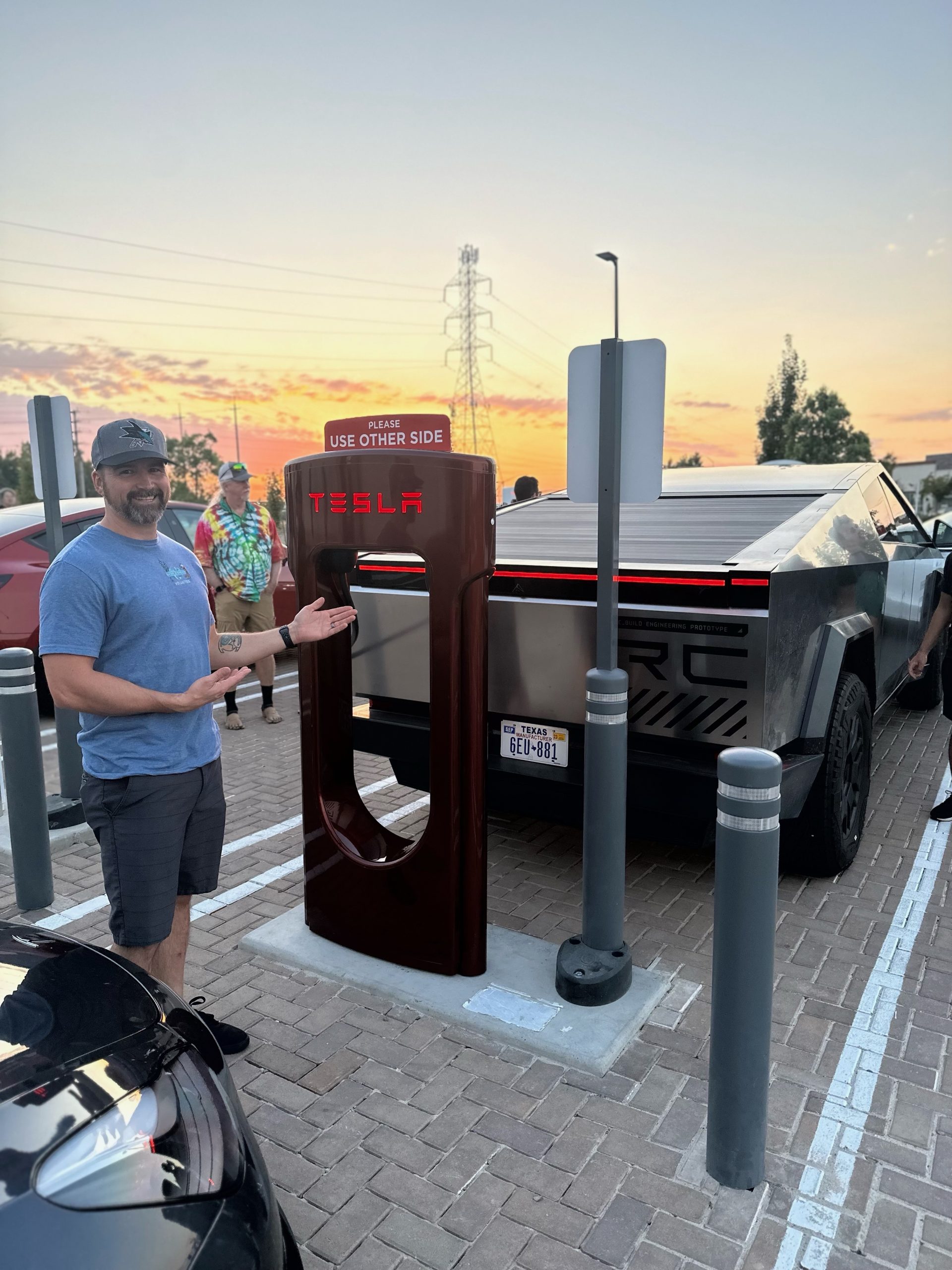 tesla-cybertruck-charges-at-50000-th-supercharger-original-scaled.jpg