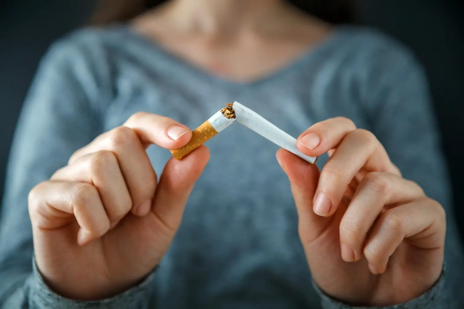 Woman-Quit-Smoking-Cigarettes-Concept-1536x1024.webp