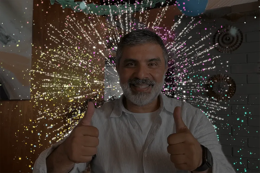 macos_sonoma_video_gesture_fireworks_two_thumbs_up.webp