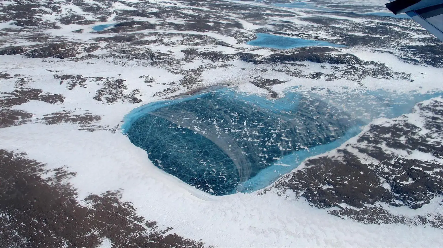 Greenland-Frozen-Meltwater-Lake-1536x862.webp