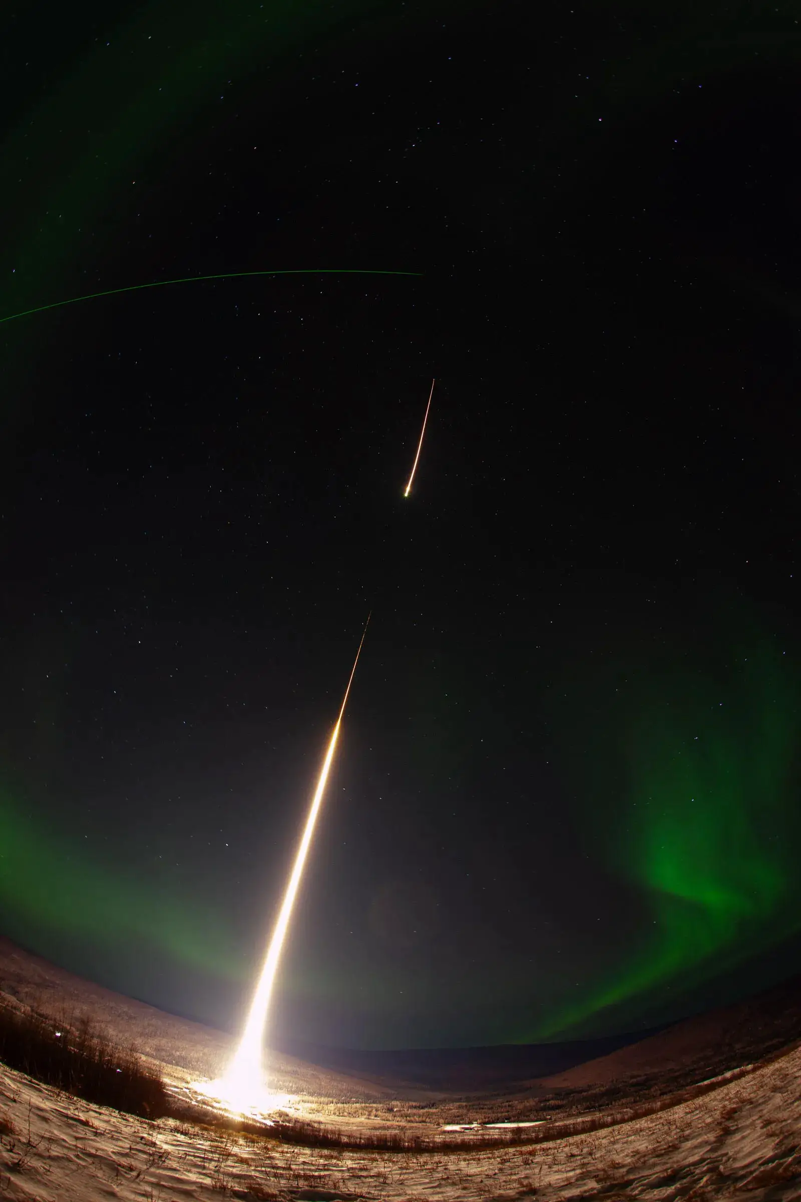 NASA-Sounding-Rocket-Launches-Into-Alaskan-Aurora.webp