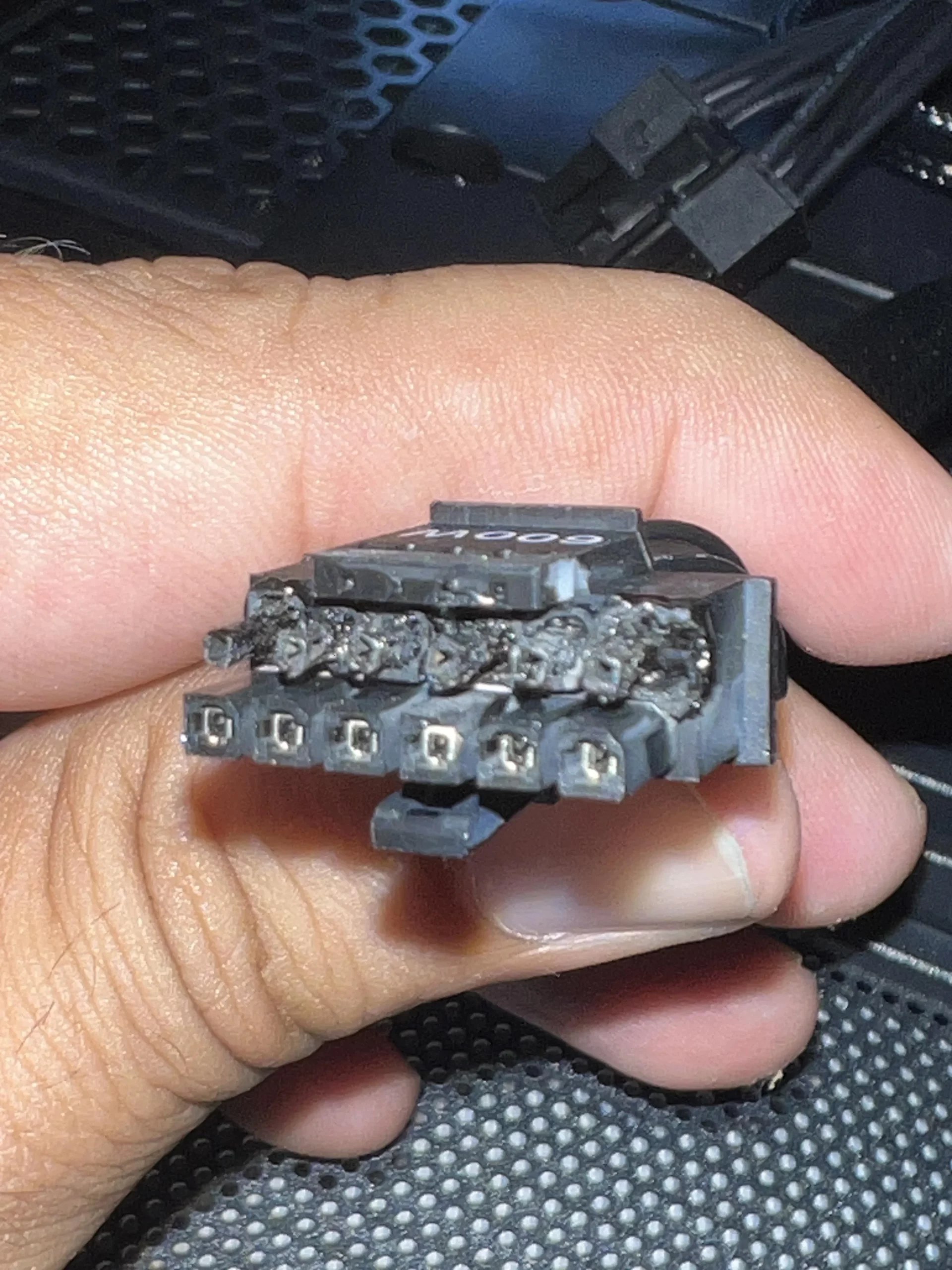 12VHPWR-16-Pin-Cable-Melt-PSU-Side-_2-scaled.webp