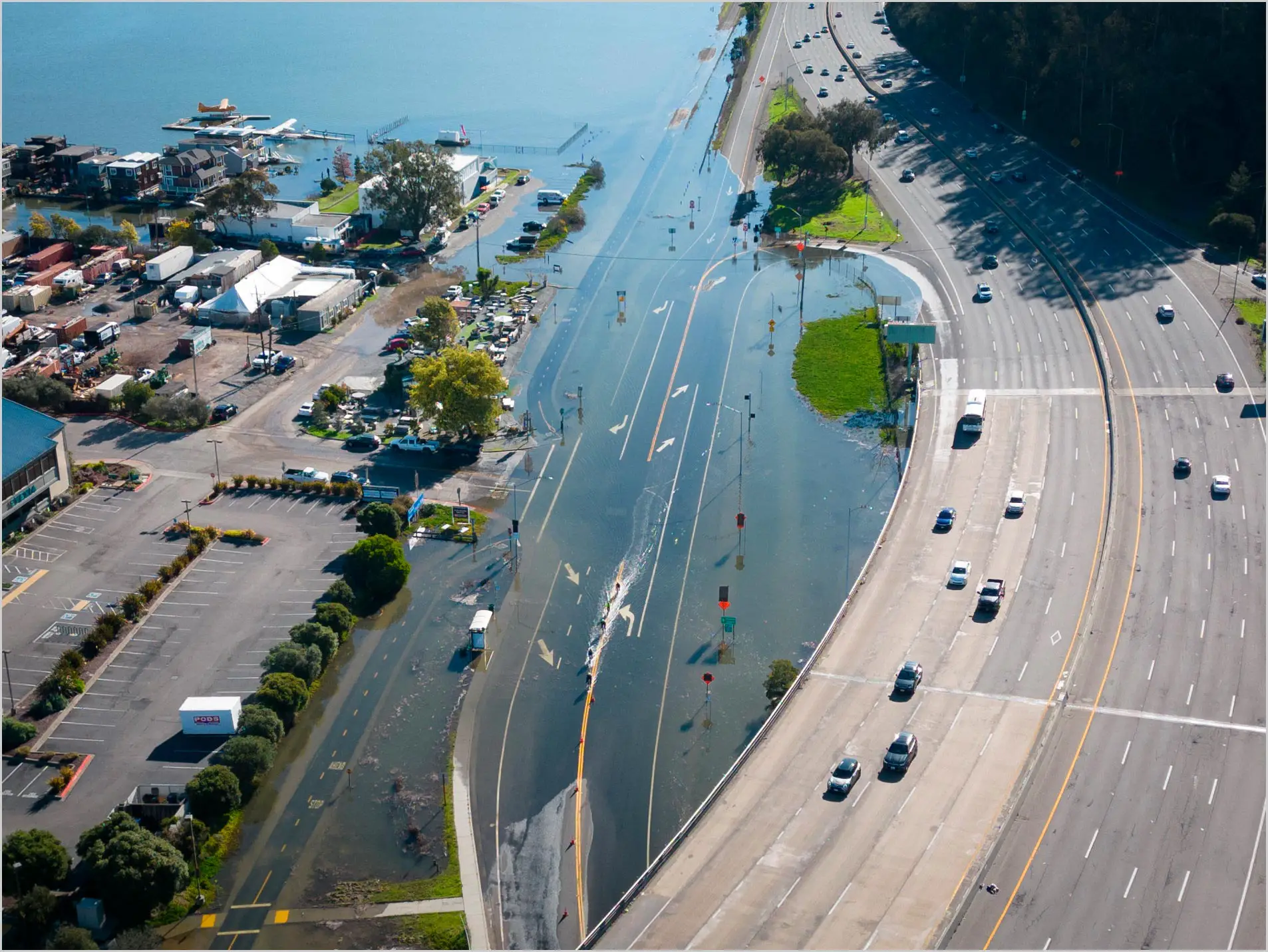 King-Tide-Floods-Highway-On-Ramp.webp