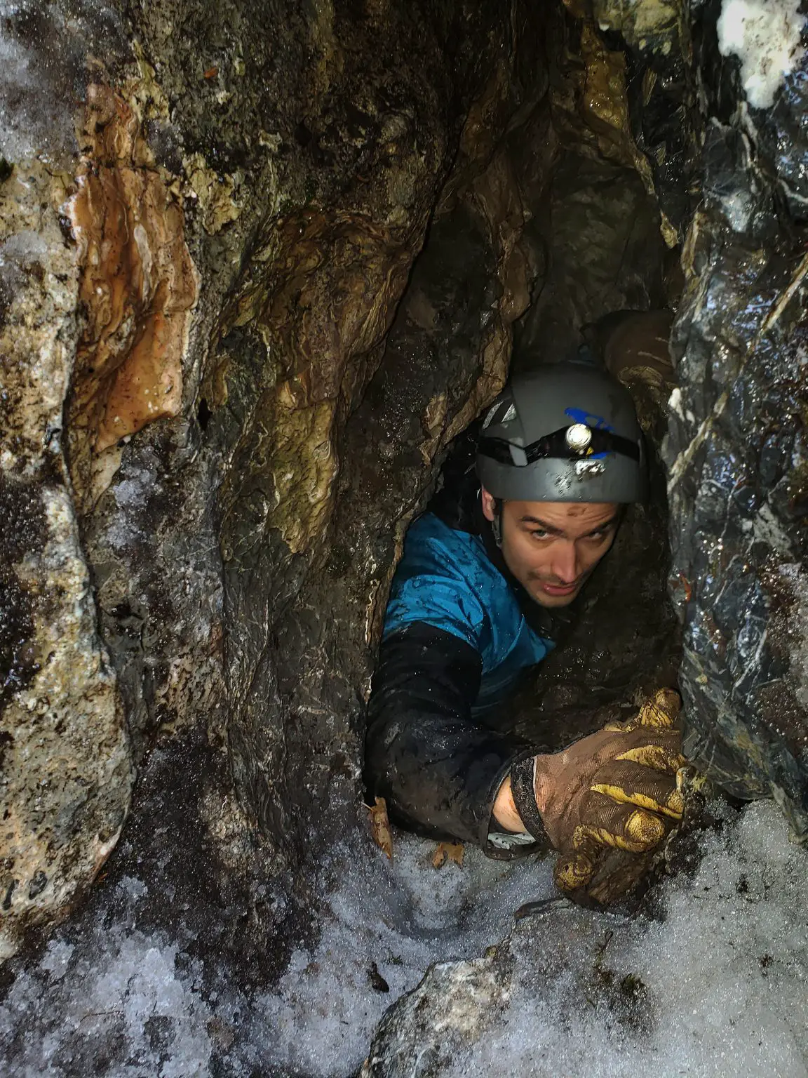 Tyler-Faith-Squeezes-Through-the-Narrow-Opening-of-an-Undisclosed-Cave-1152x1536.webp
