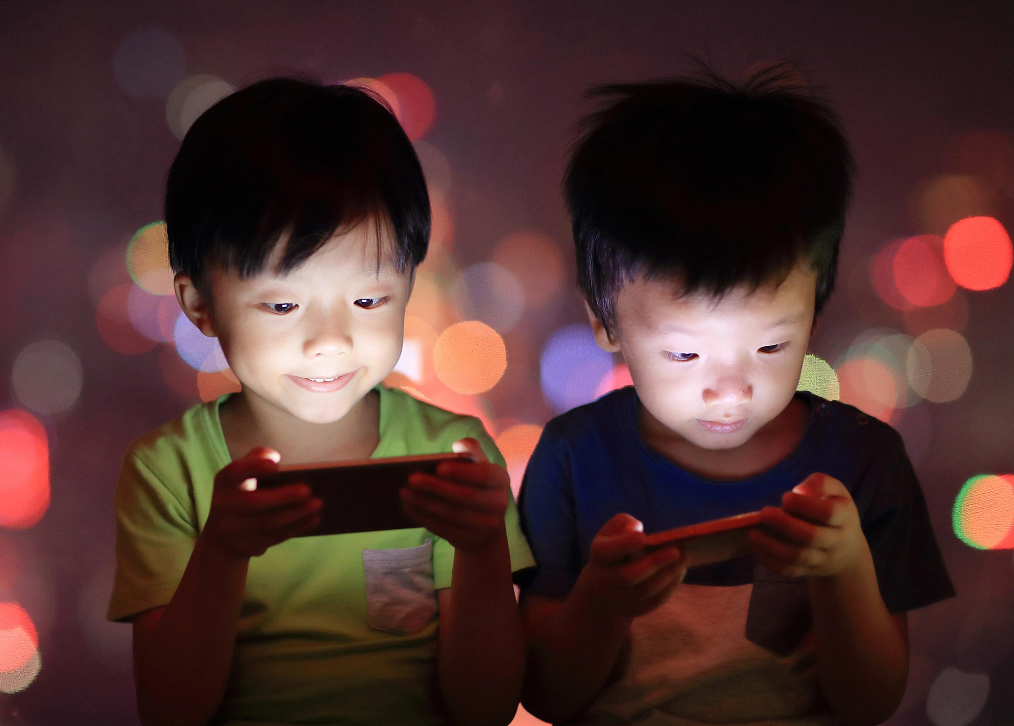 Young-Boys-Using-Smartphones.jpg