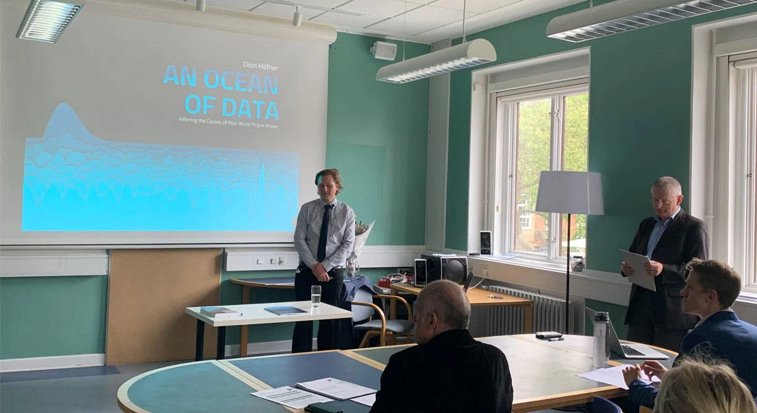Dion-Hafner-Defending-His-PhD-Thesis.webp