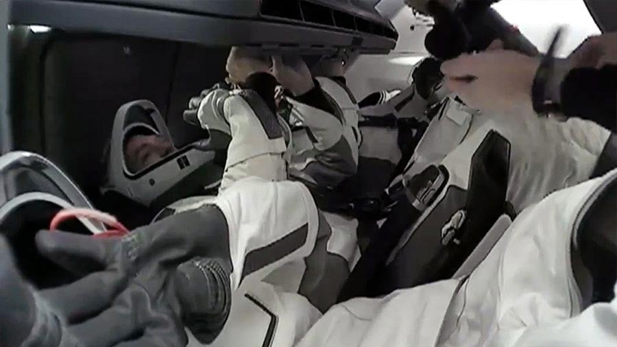 Axiom-Mission-3-Crew-Members-Seated-Inside-SpaceX-Dragon-Spacecraft-Undocking.jpg