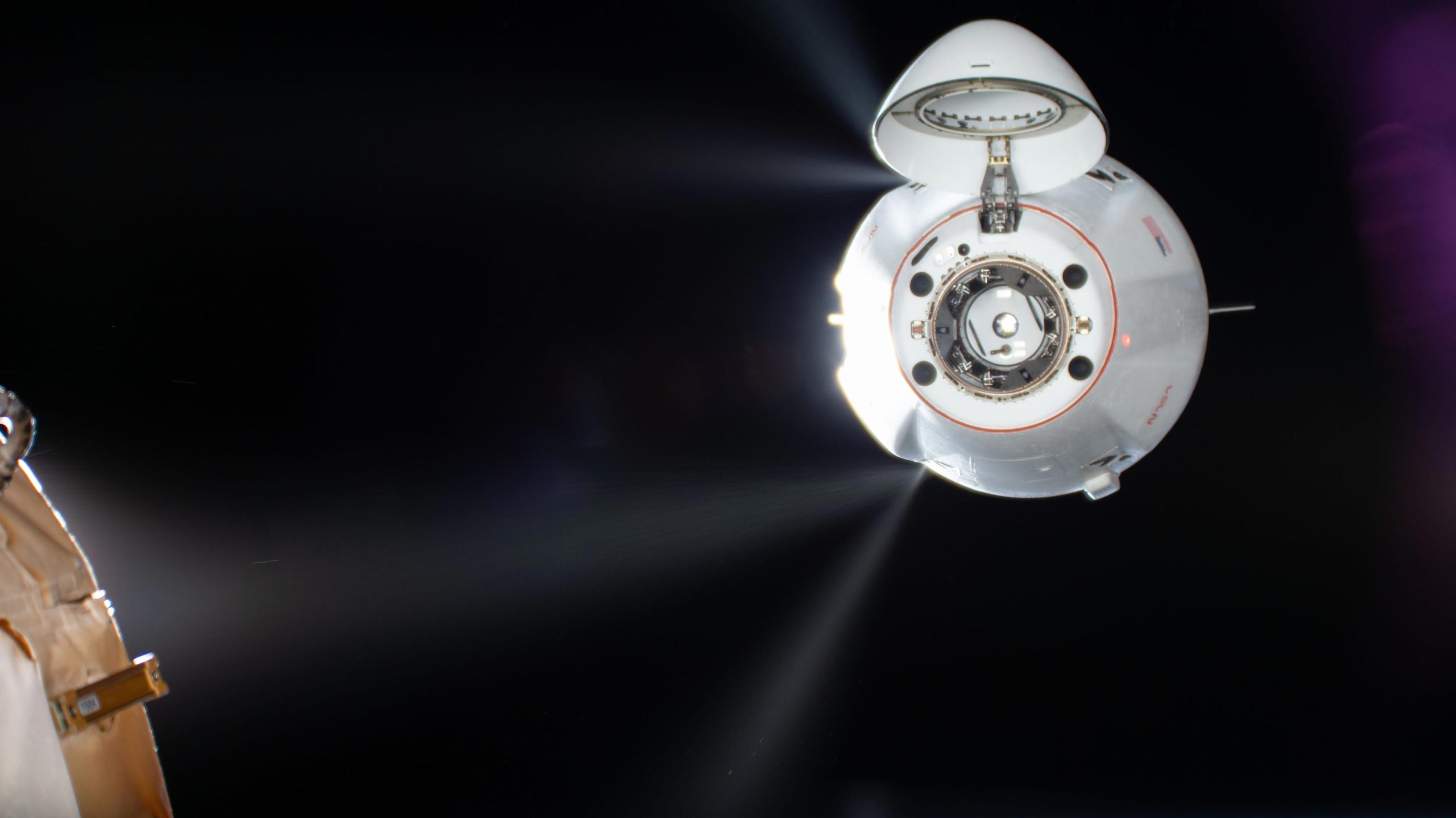 Thrusters-Fire-on-SpaceX-Dragon-Cargo-Spacecraft-scaled.jpg