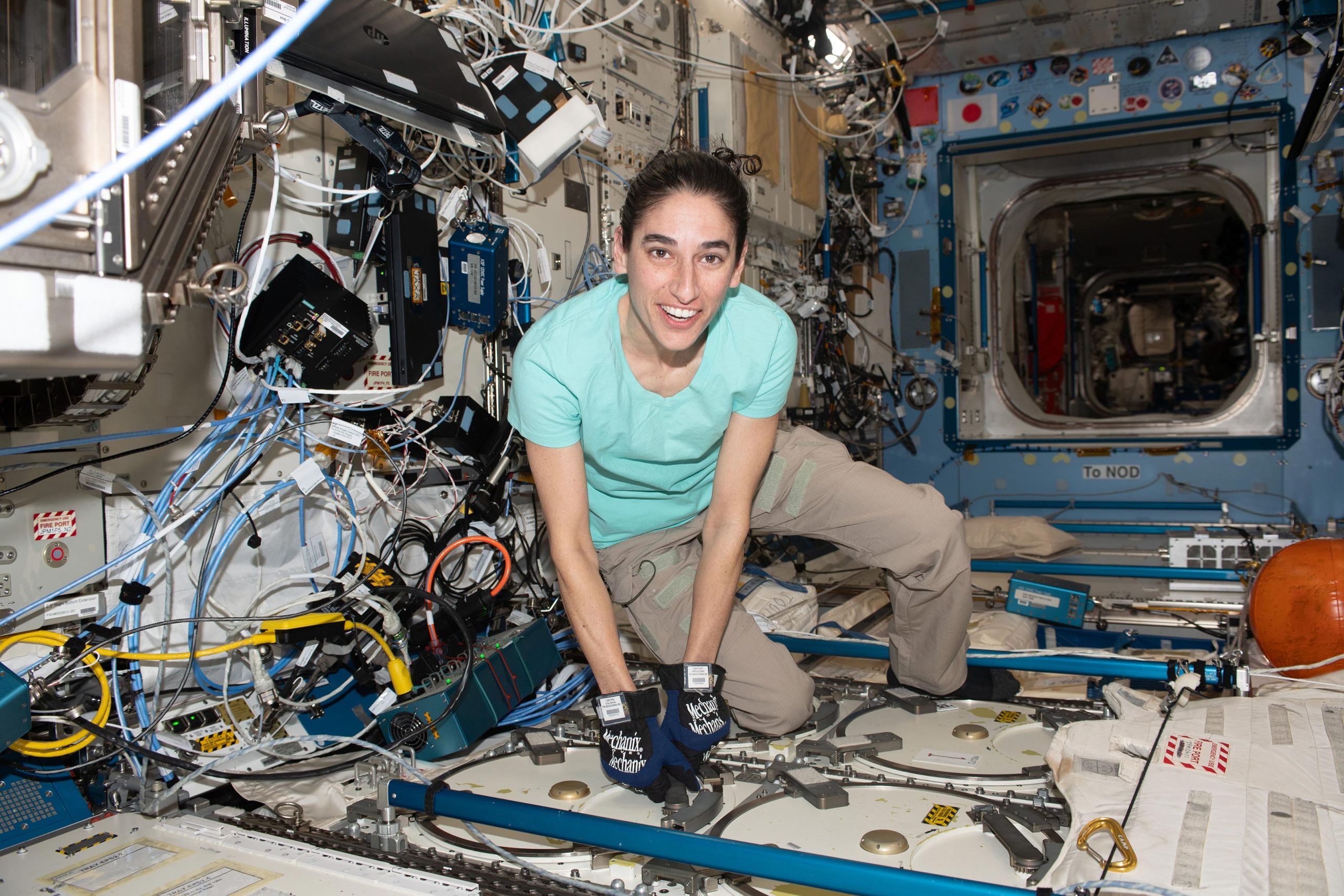 Astronaut-Jasmin-Moghbeli-Opens-Science-Freezer-That-Hosts-Research-Samples-scaled.jpg