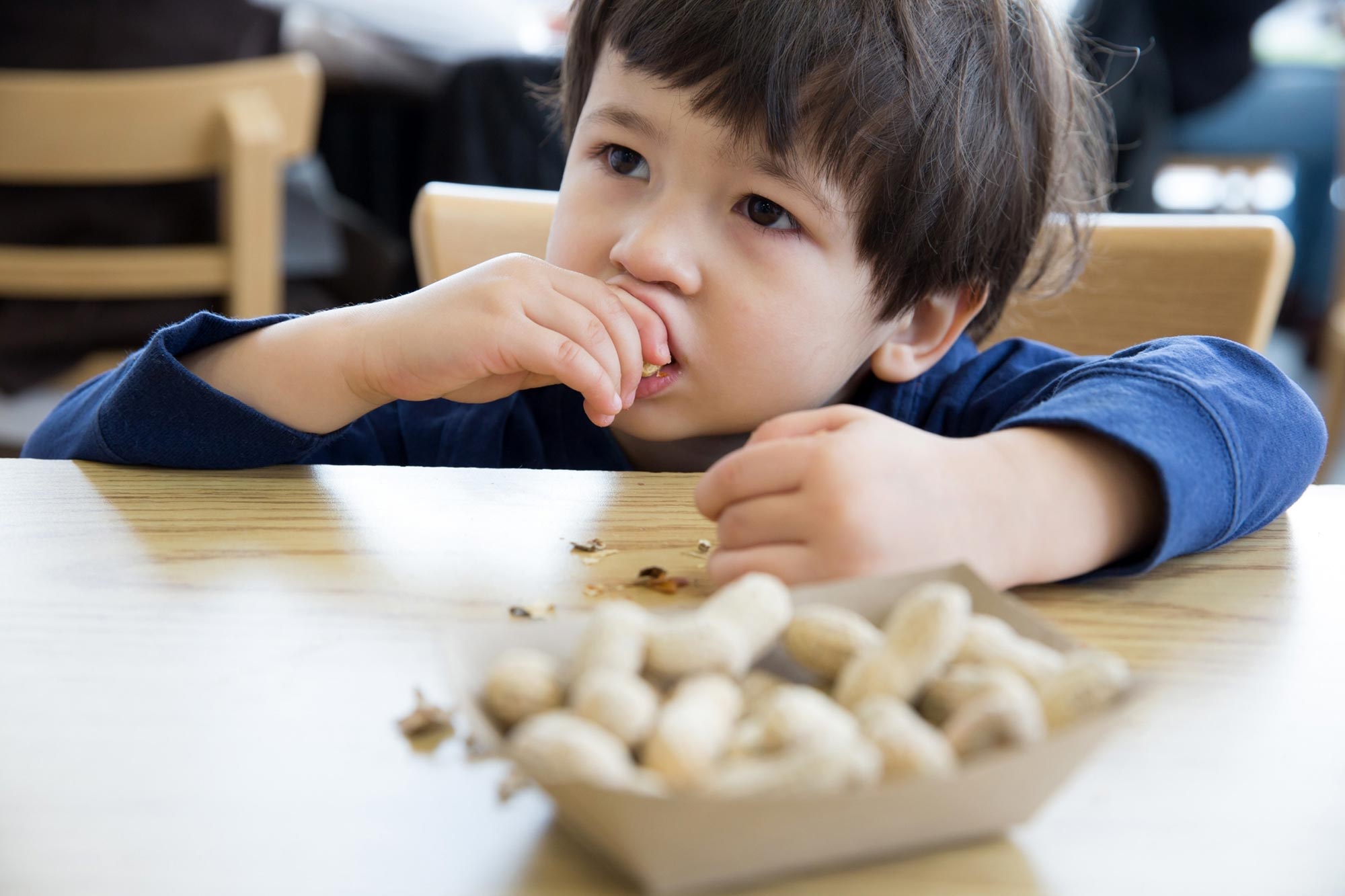 Food-Allergies-Child-Eating-Peanuts.jpg