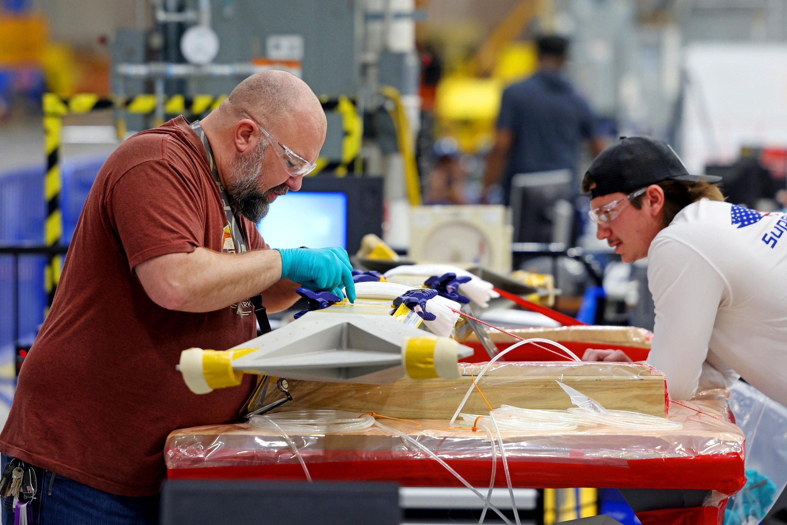 Technicians-NASA-Michoud-Assembly-Facility-Prepare-Elements-Midbody-Exploration-Upper-Stage-scaled.jpg