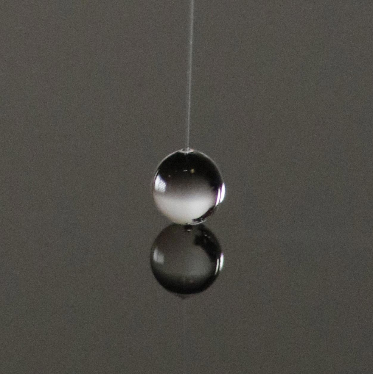 Water-Droplet-Probed-by-Micropipette-Force-Sensor.jpg