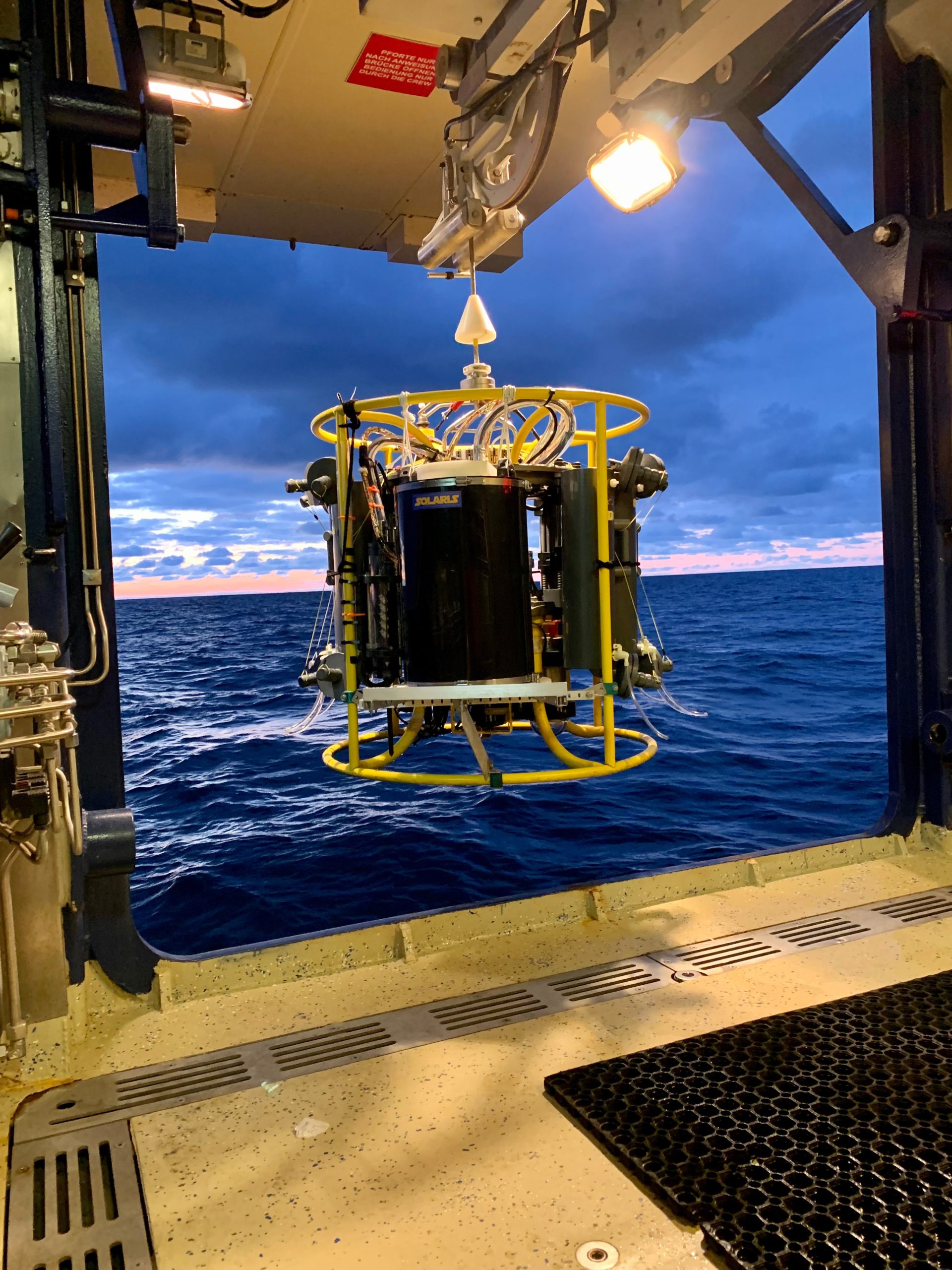 Early-Morning-Cast-To-Collect-Water-Samples-scaled.jpg