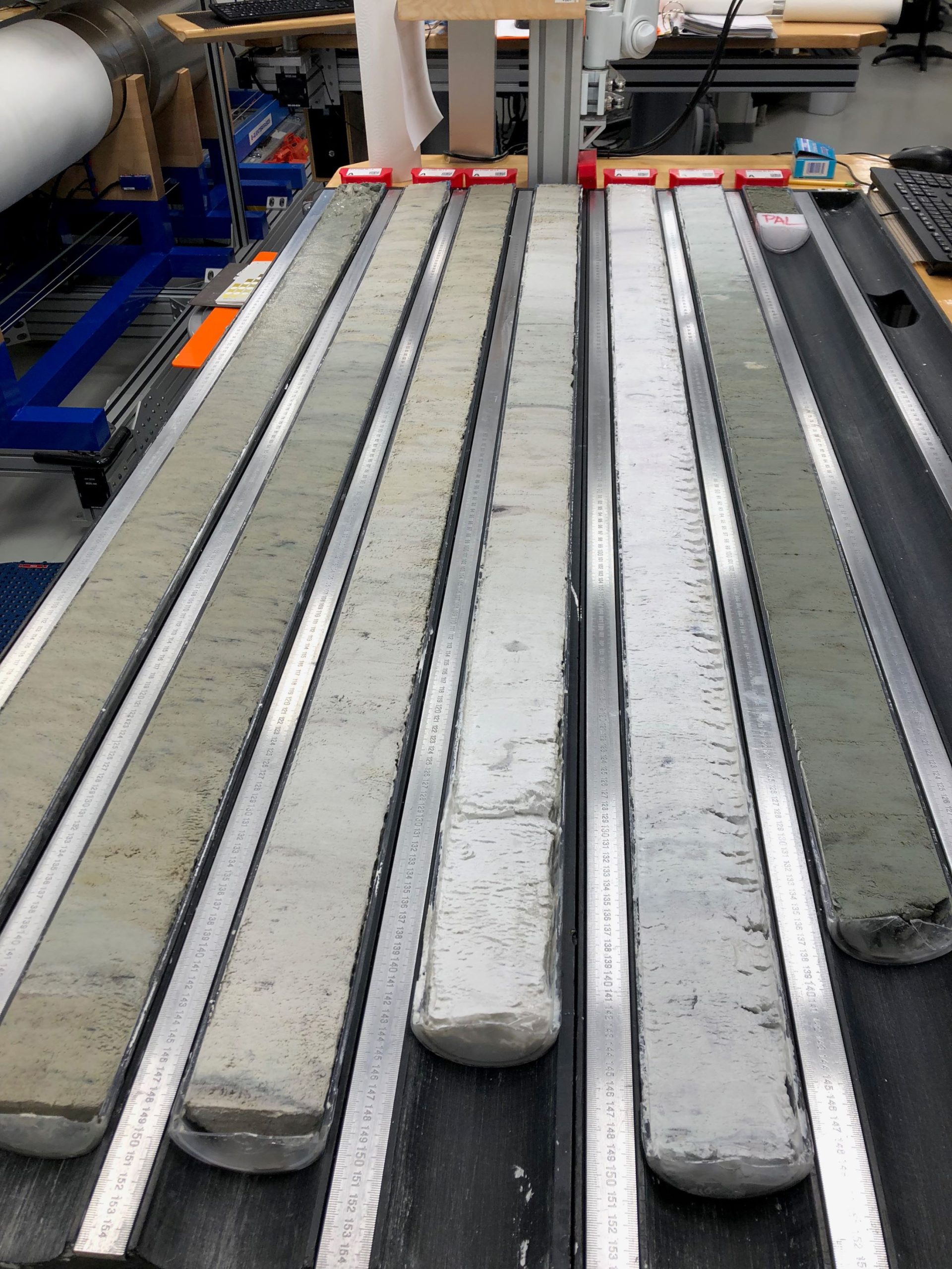 Fresh-Sediment-Cores-Aboard-the-Drill-Ship-JOIDES-Resolution-scaled.jpg
