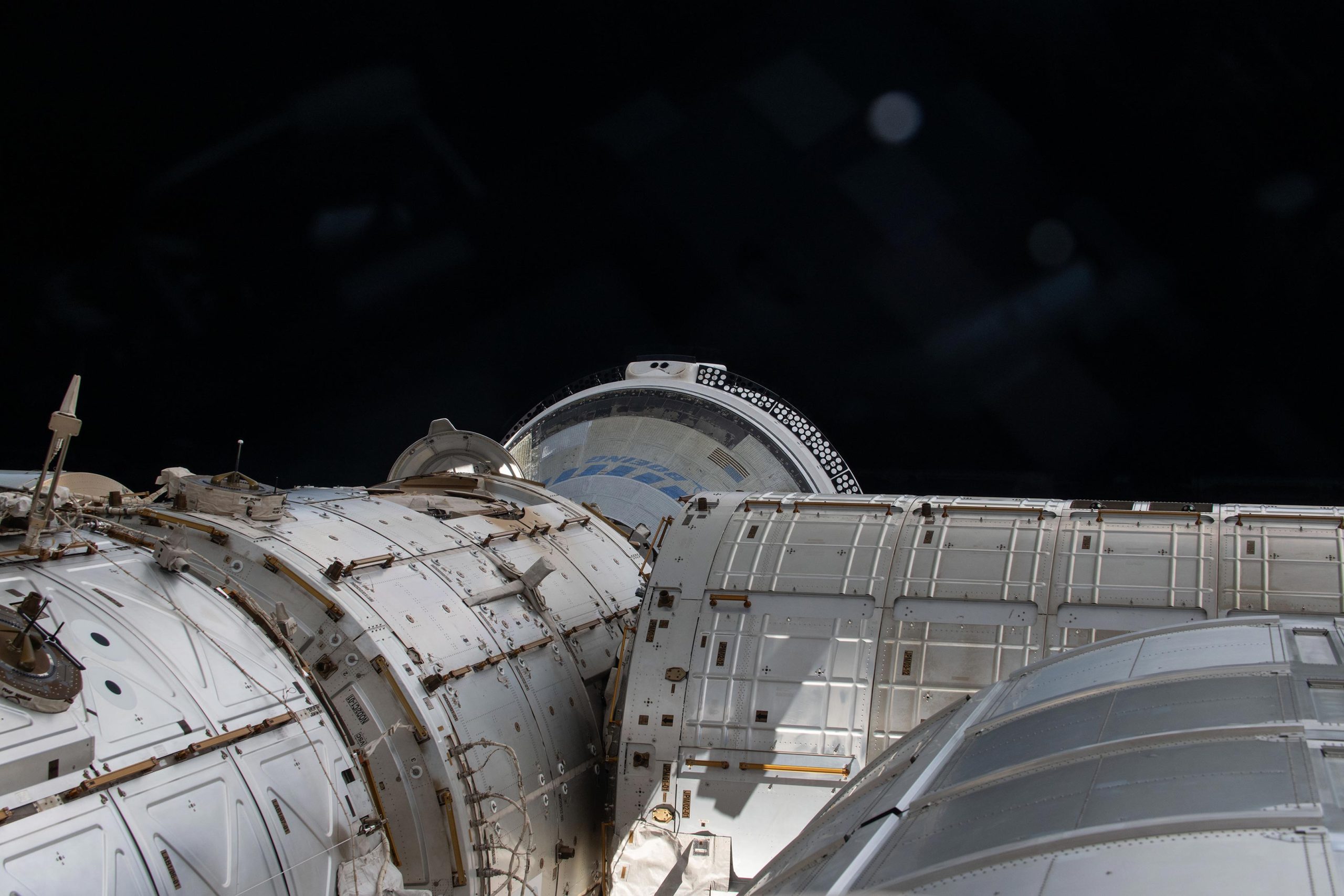 Boeing-Starliner-Spacecraft-Docked-Harmony-Module-scaled(1).jpg