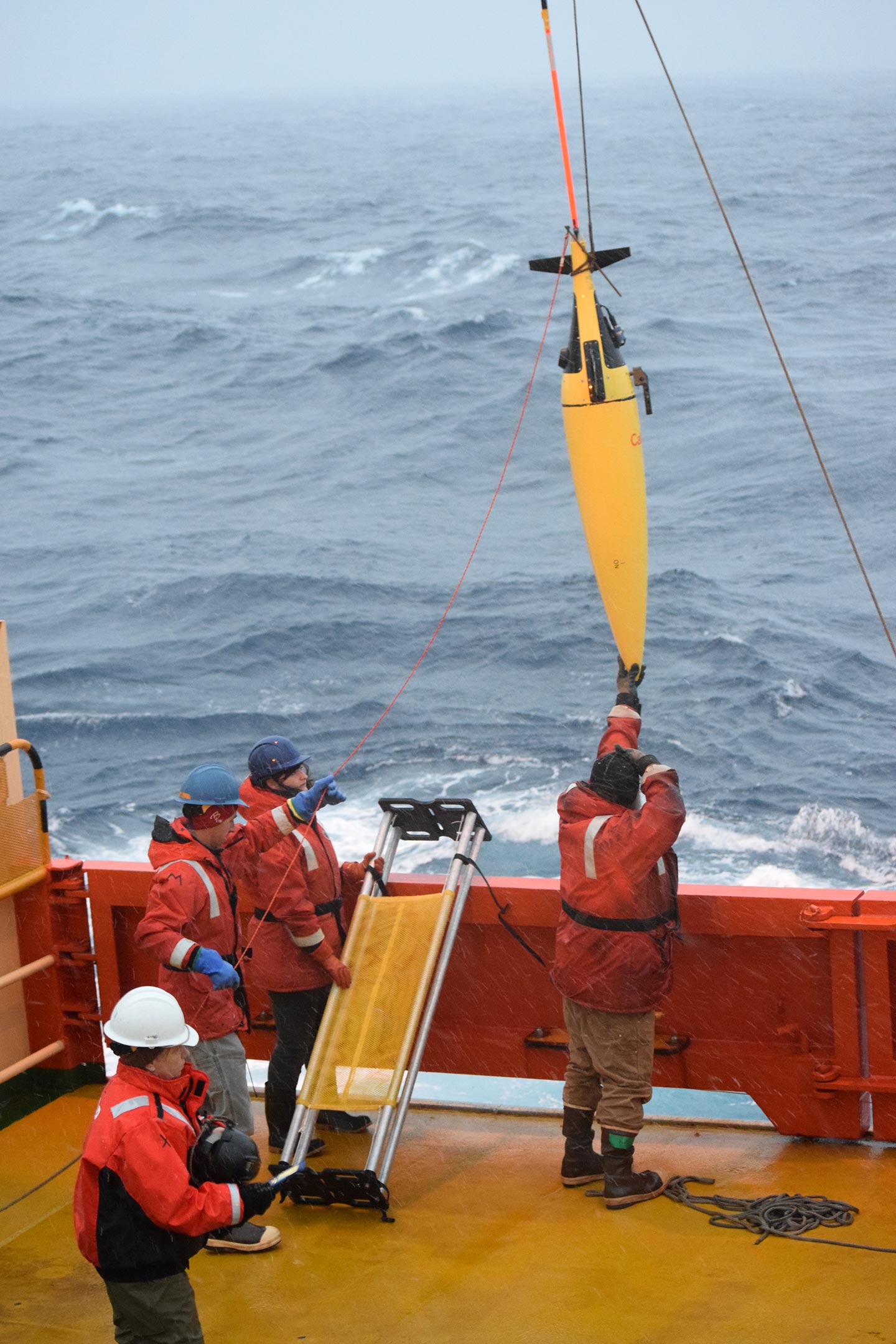 Antarctica-Researchers-Taking-Mesurements.jpg