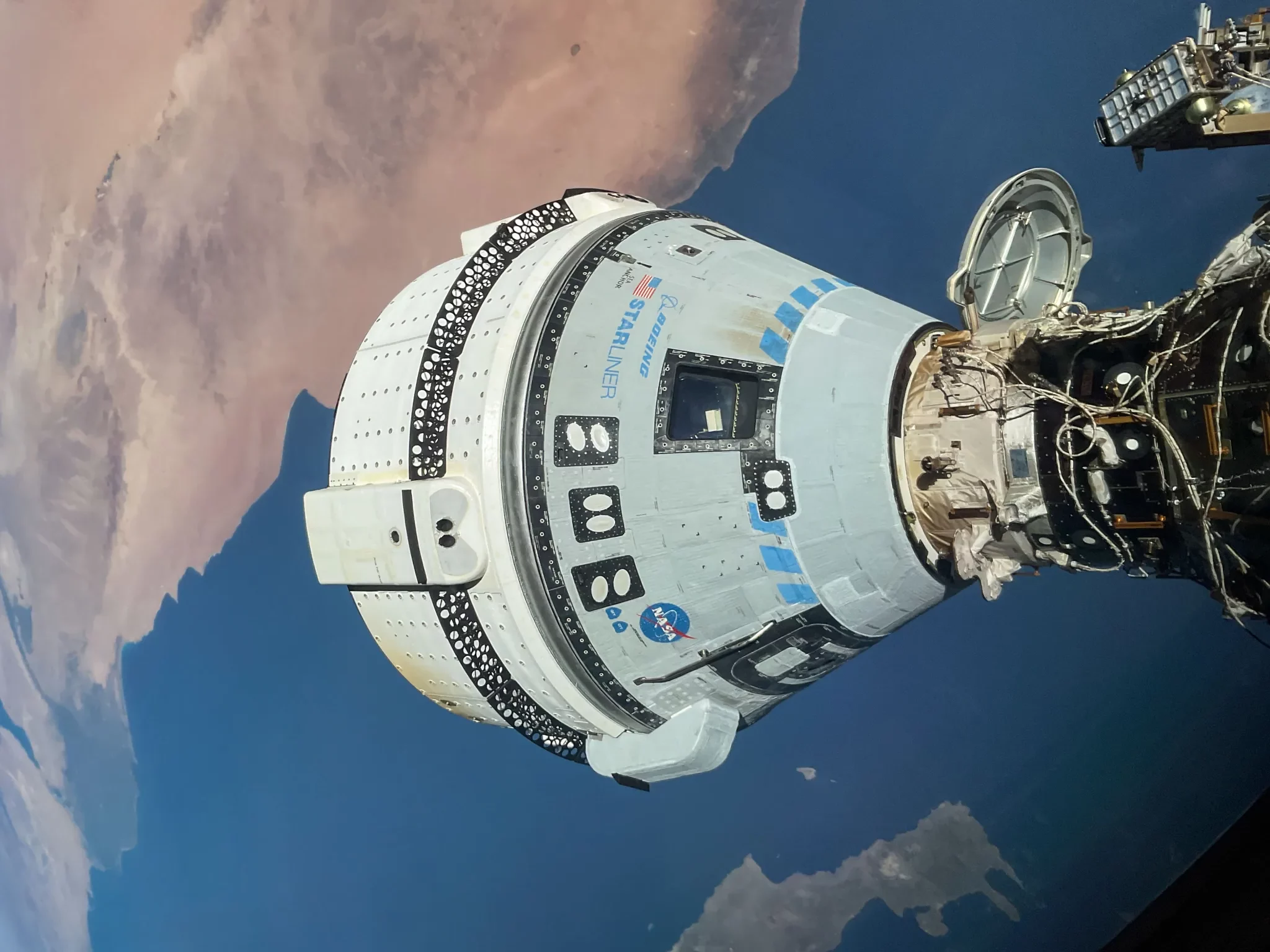 BOEING-STARLINER-DOCKED-ISS-e1719604301167.webp