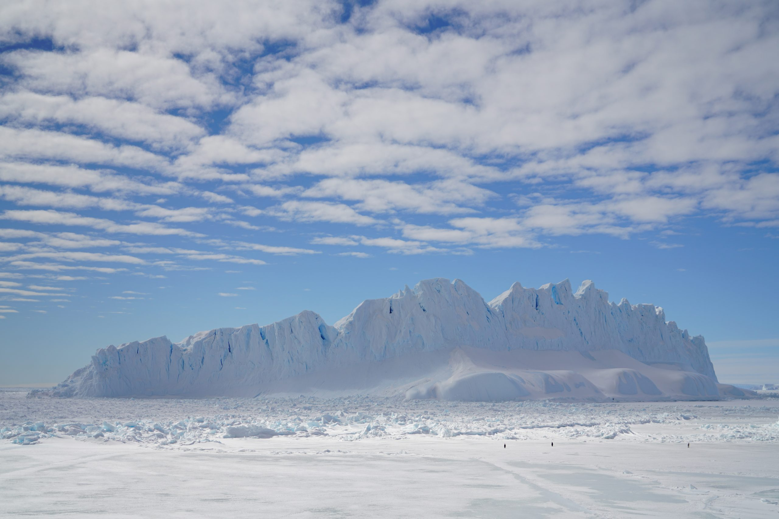 Iceberg-Collapsed-From-an-Antarctic-Ice-Sheet-With-Clouds-Influenced-by-Gravtity-Waves-scaled_jpg.jpg