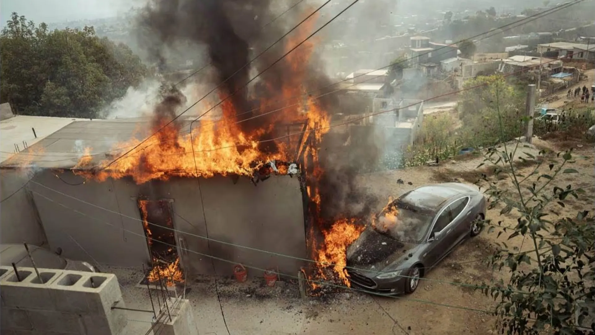 Tijuana-Model-S-house-fire-by-Omar-Martinez-Noyola-of-cuartoscuro.webp