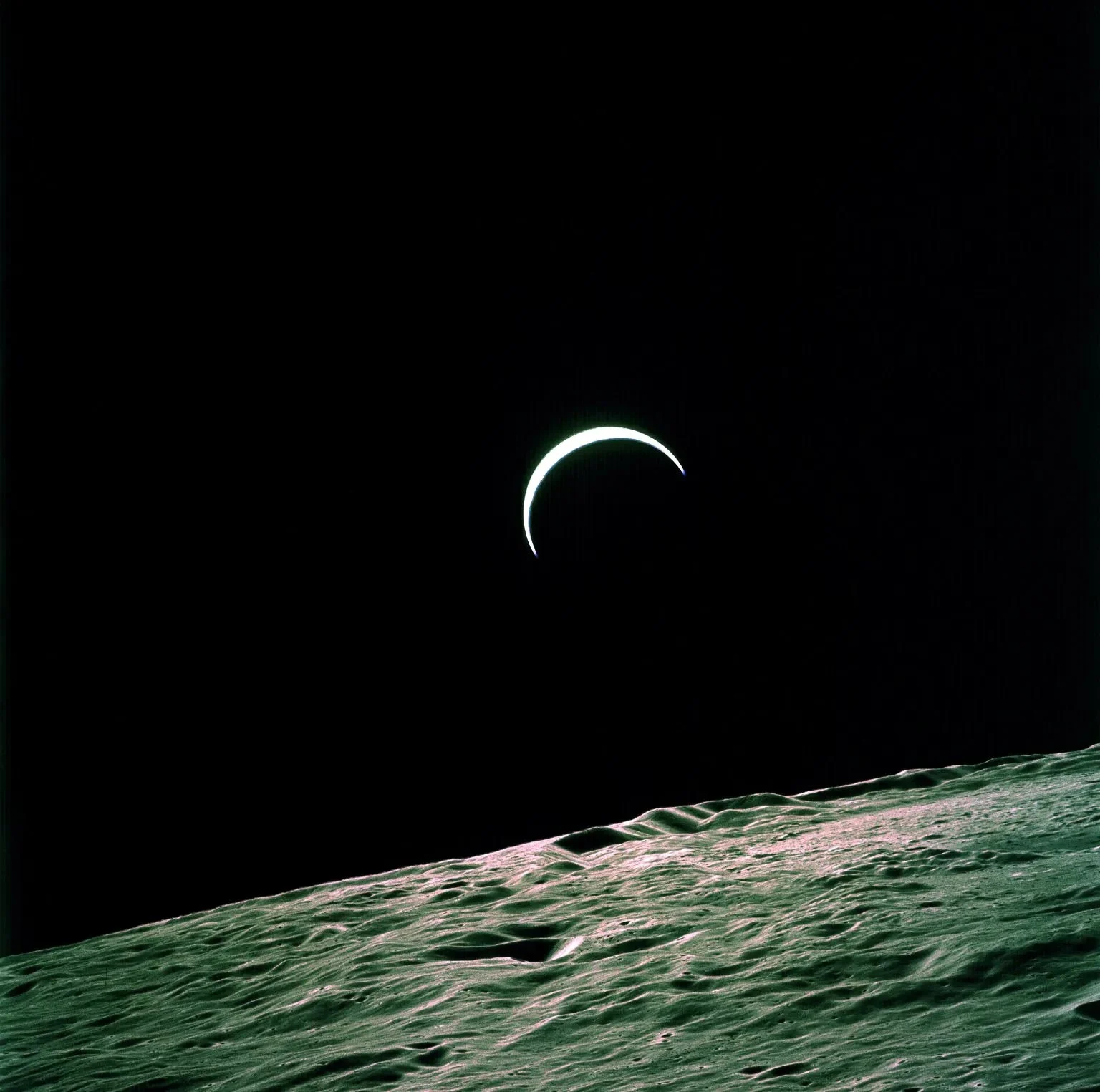 Earth-Crest-Over-Lunar-Horizon.webp