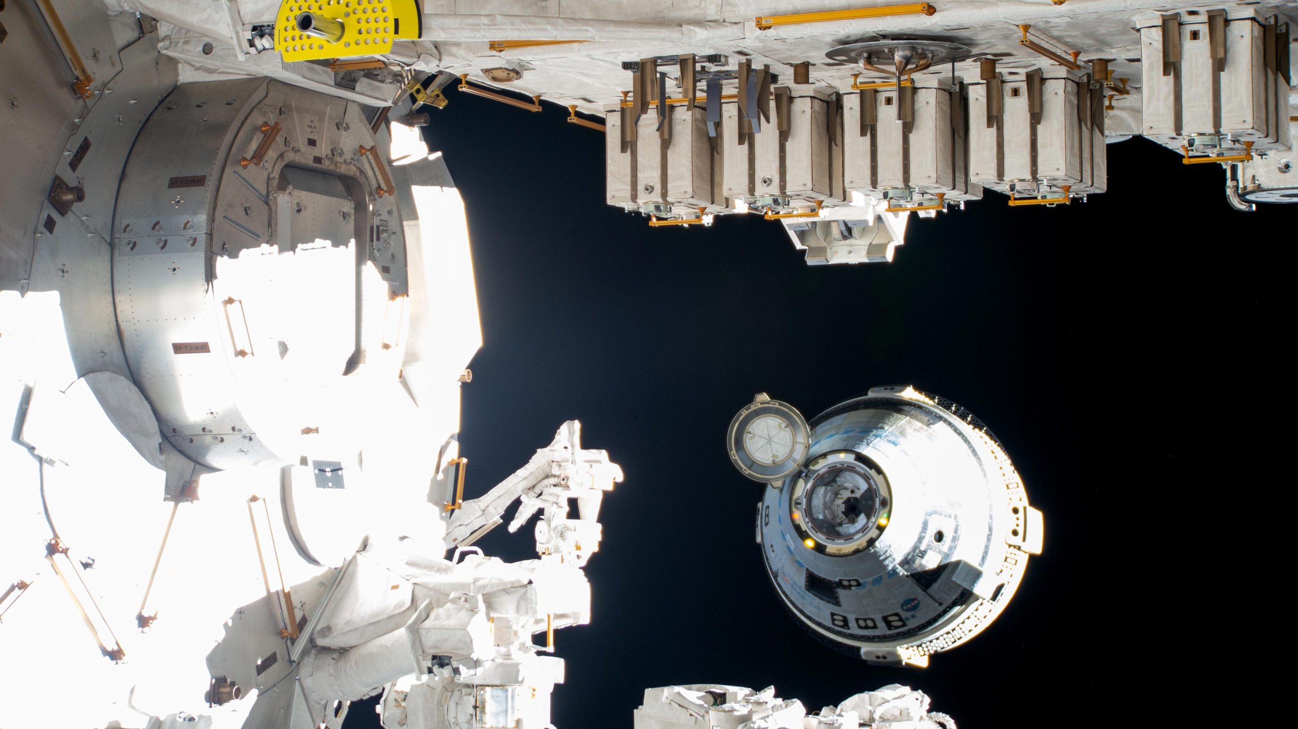 Boeings-Uncrewed-Starliner-Spaceraft-Backs-Away-From-International-Space-Station-scaled.jpg
