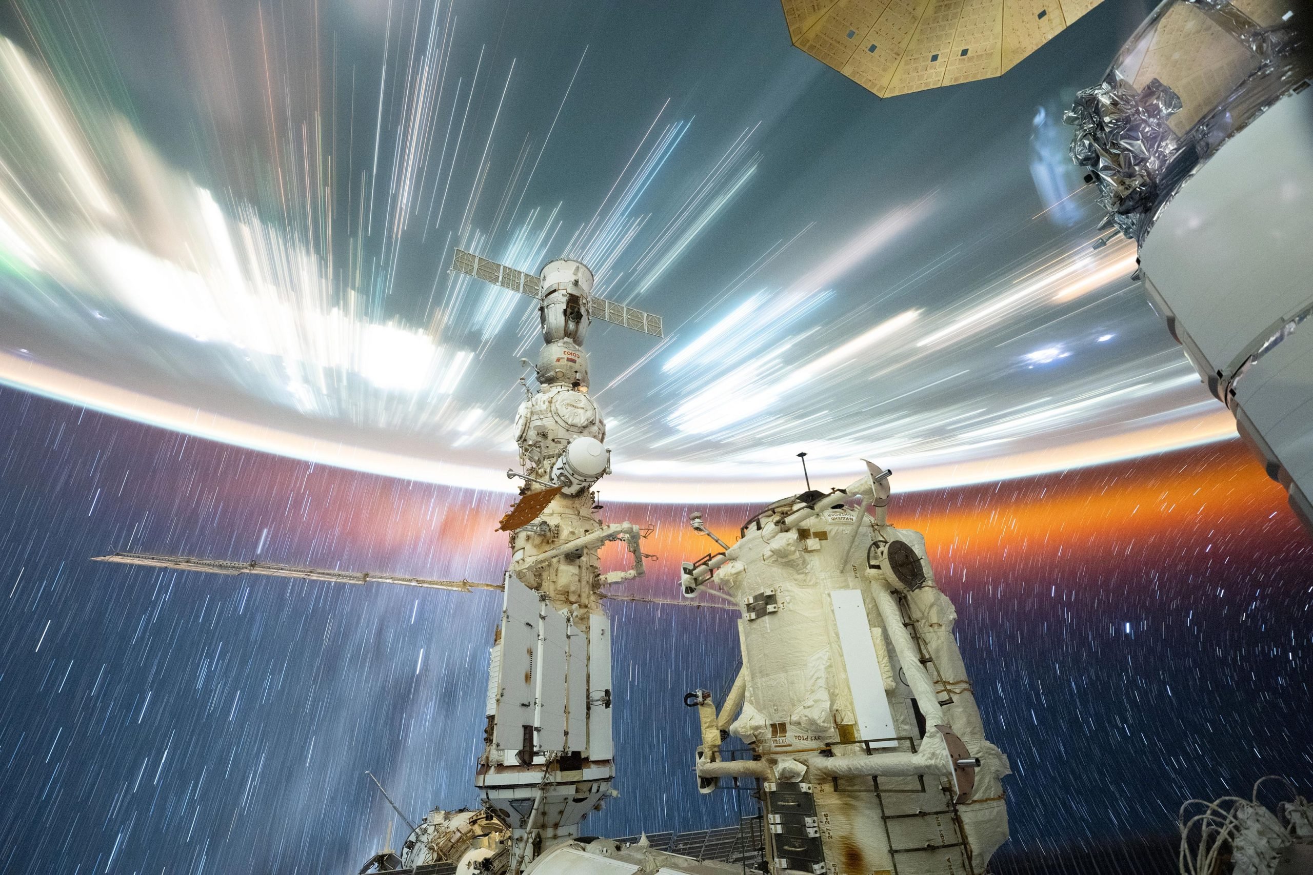 Star-Trails-and-Streaks-of-City-Lights-From-Space-Station-scaled.jpg
