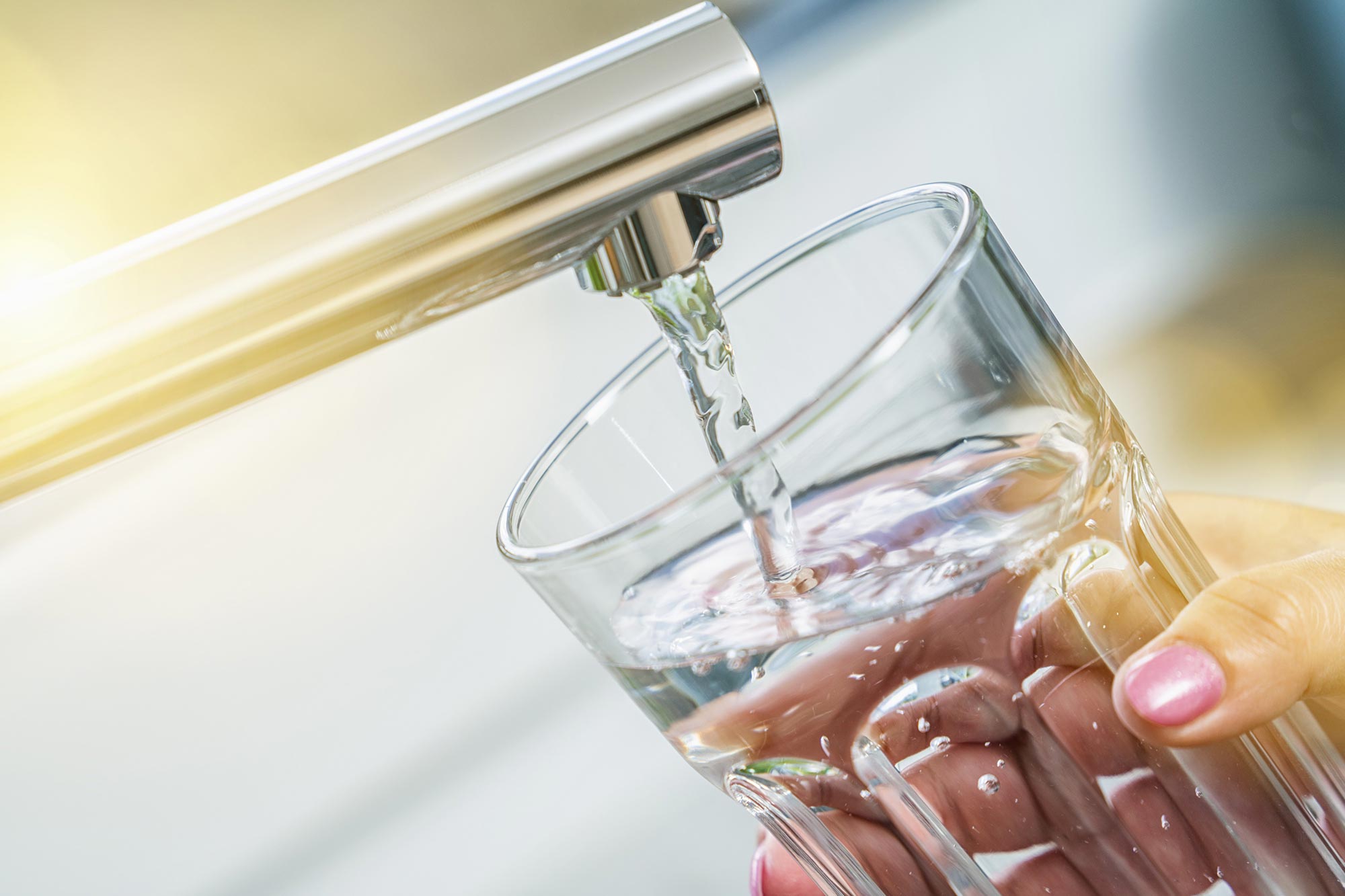 Filling-Water-Glass-From-Tap.jpg