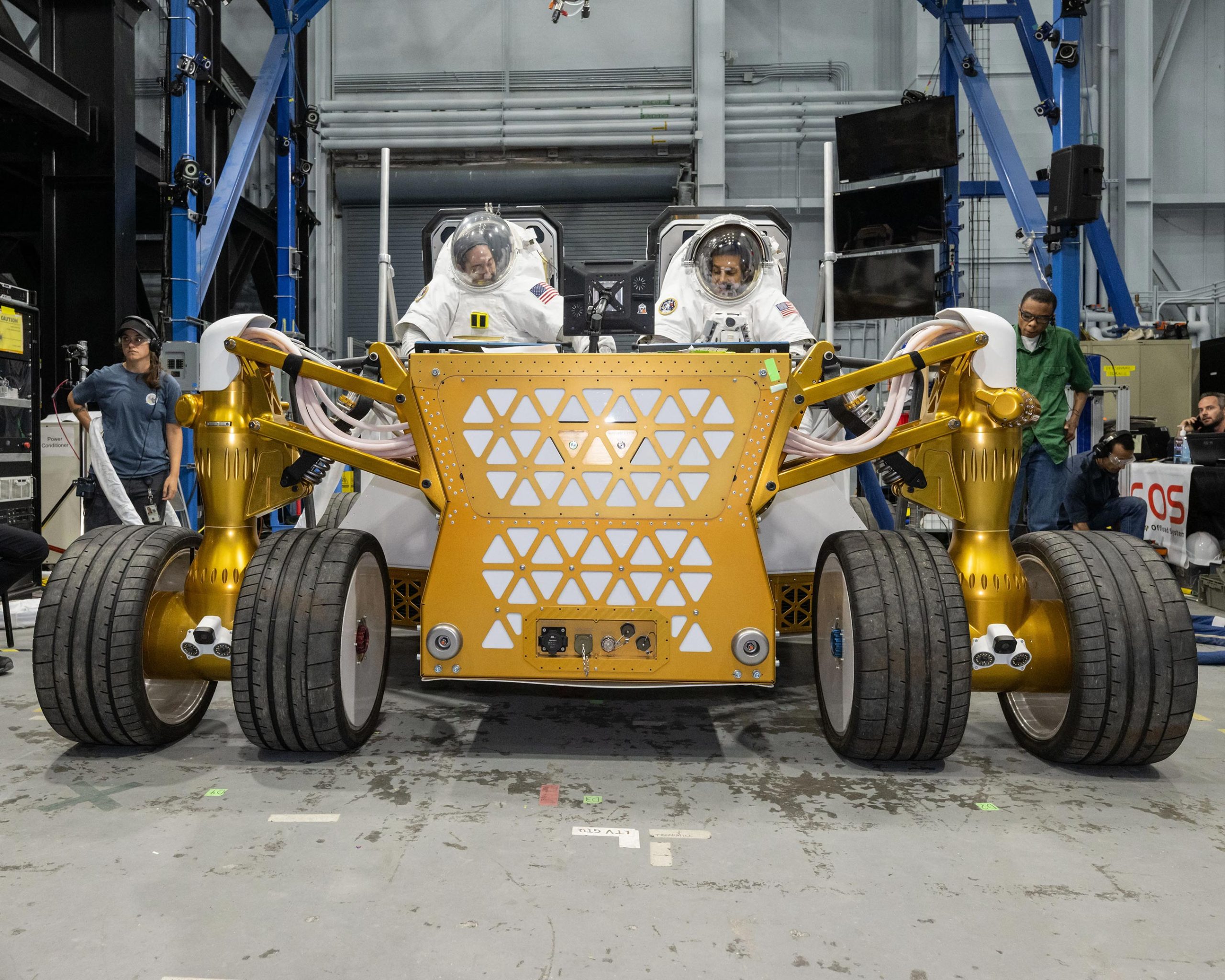 Suited-NASA-Engineers-Rover-Prototype-scaled.jpg