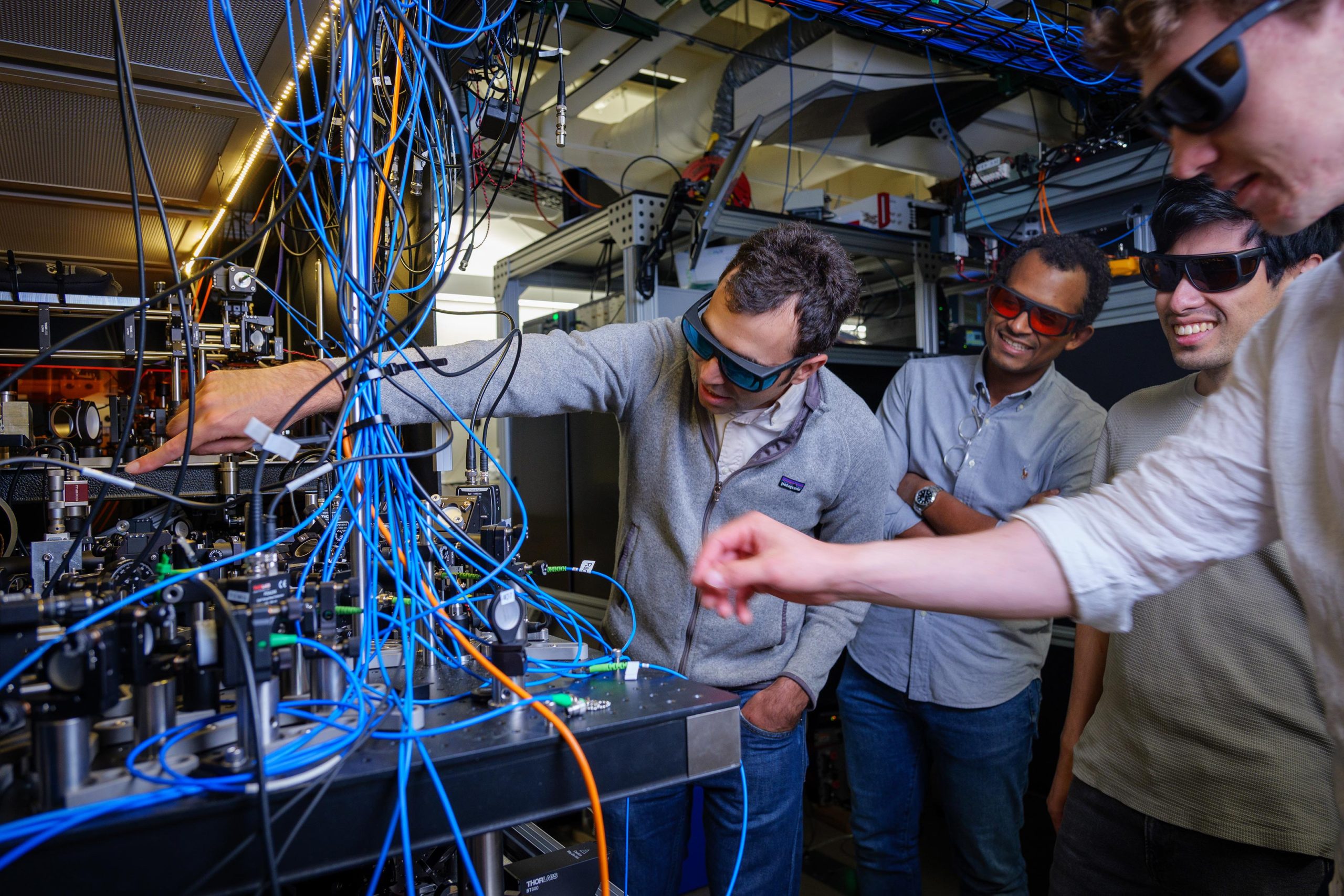 Ticking-of-Atoms-scaled.jpg