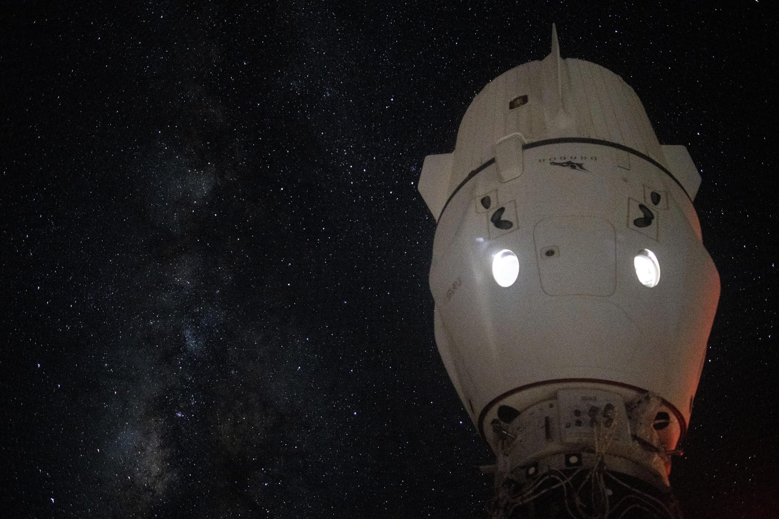 Milky-Way-Appears-Behind-SpaceX-Dragon-Endeavour-scaled.jpg