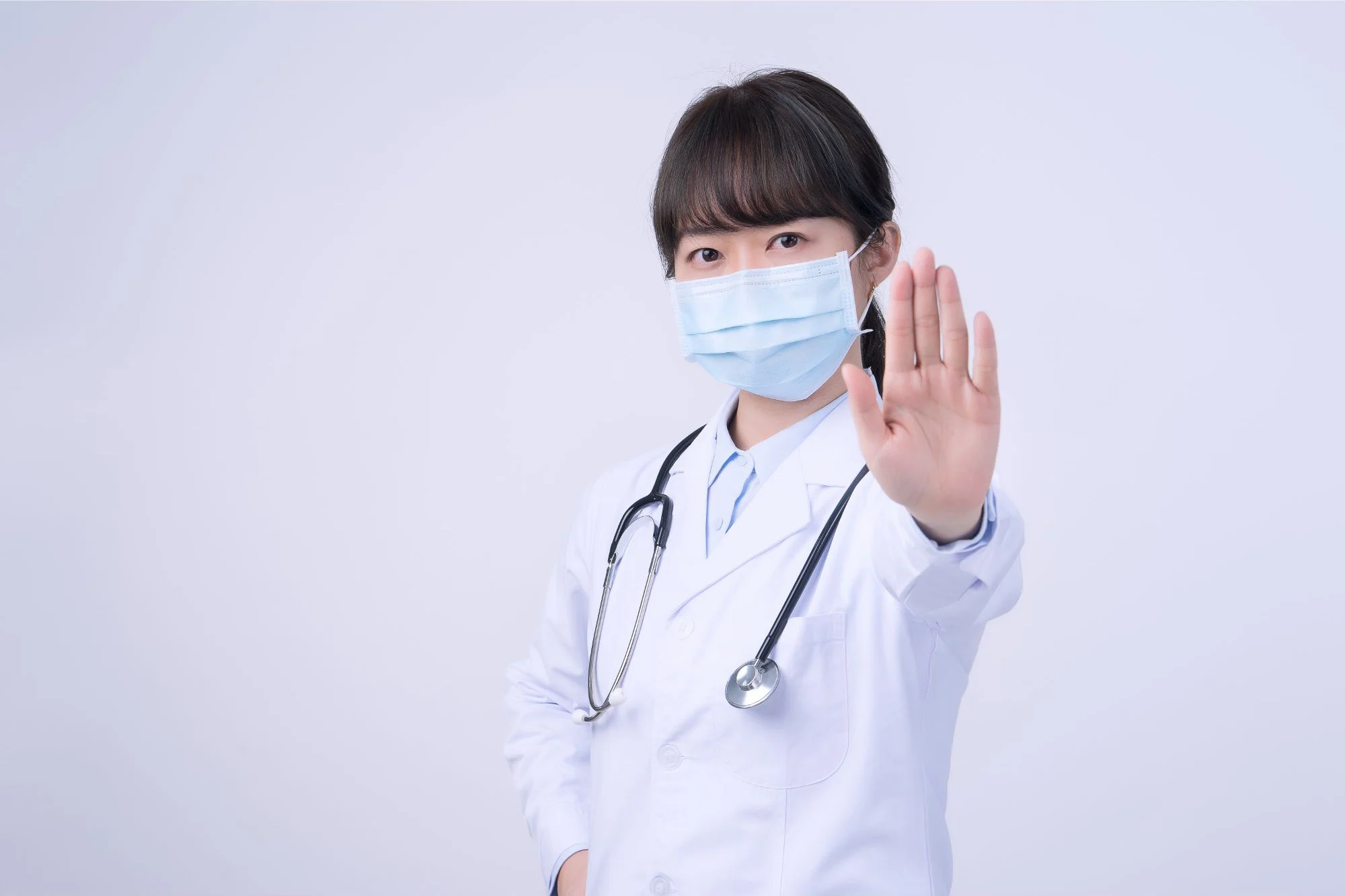 Young-Woman-Doctor-Mask-No.webp