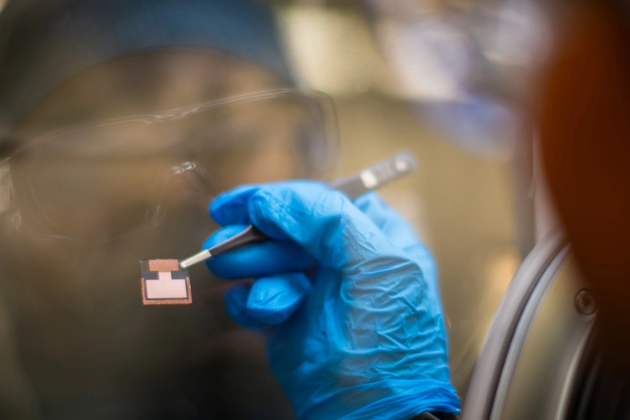 Surrey-Scientists-Holding-Perovskite-Cell-scaled.jpg