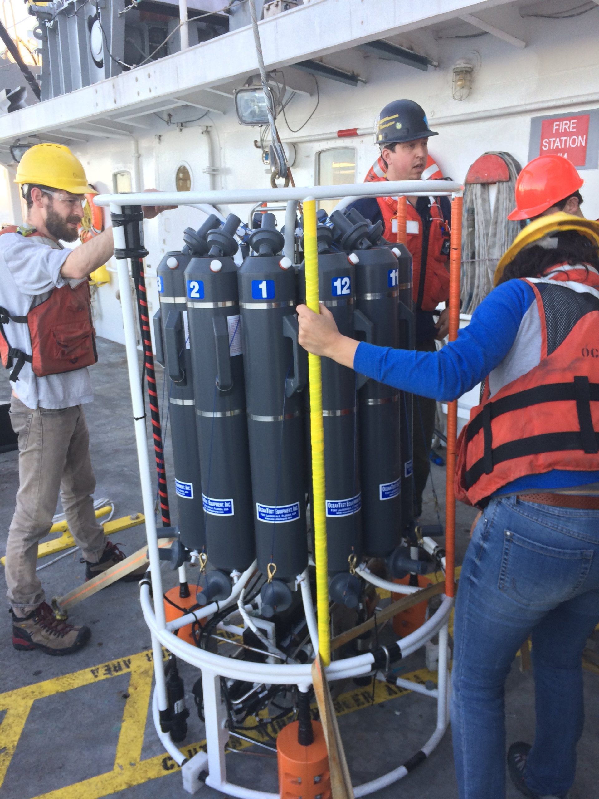 Stanford-Scientists-Aboard-a-Research-Cruise-Prepare-a-Rosette-of-Bottles-scaled.jpg