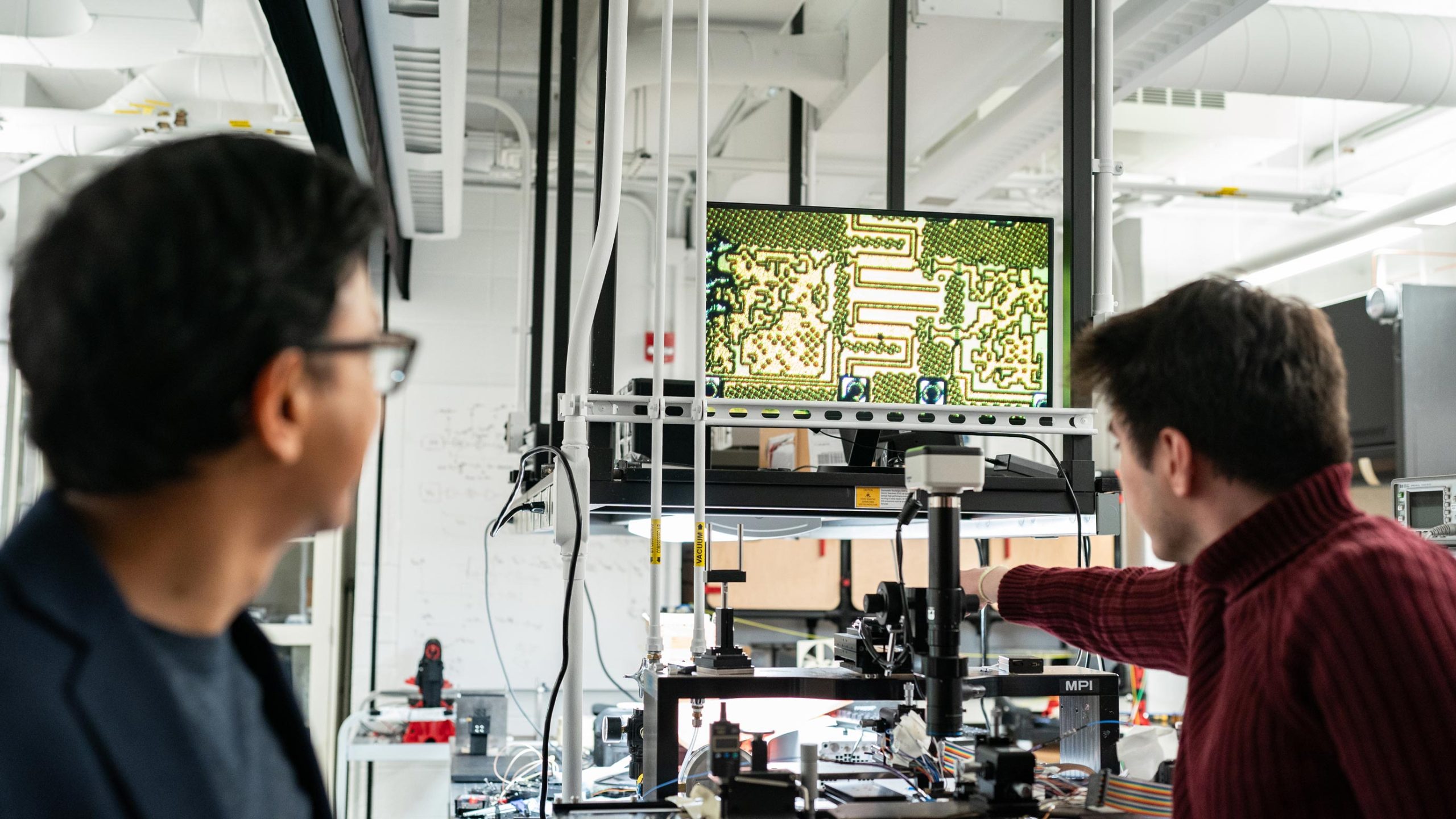 AI-Designed-Chip-Researchers-scaled.jpg