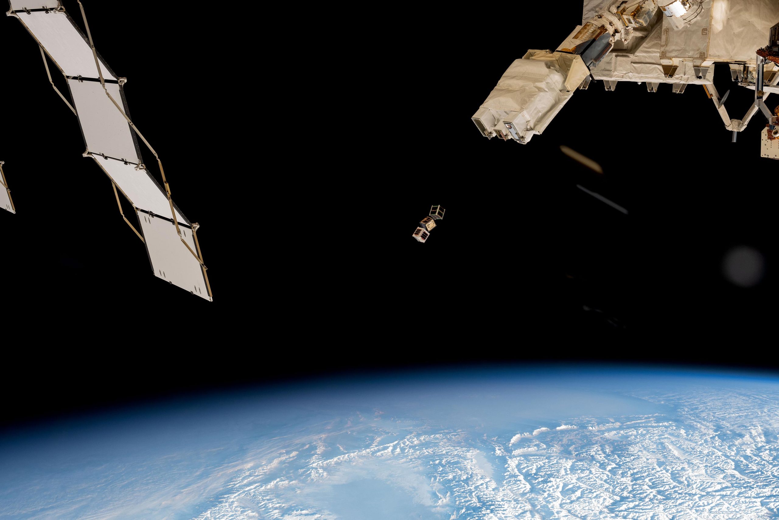 Three-CubeSats-Are-Deployed-From-Space-Station-scaled.jpg