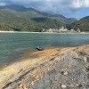 日月潭水位下降约13米：一块道光年间墓碑重见天日