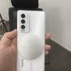 Realme GT“大师版”原型机与MagDart无线充电板谍照曝光