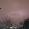 北京天空出现神秘光环 中国天气：鸟巢灯光打云上了