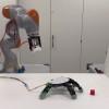这种新型机械臂可以将手分离出来抓取物体