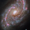 哈勃望远镜展示螺旋星系NGC5248其精致的旋臂和中央条带